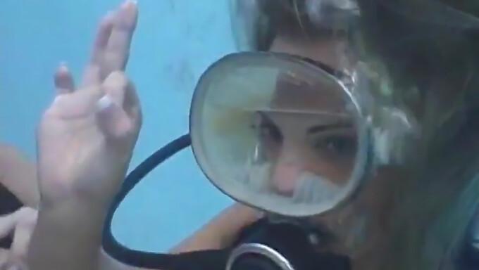 A Scuba Diver Receives A Facial Cumshot Through Her Diving Mask